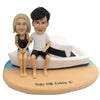 Bobblehead para na plaży z jachtem