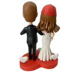 Niestandardowy bobblehead na tort weselny