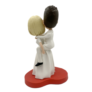 Bobbleheads ślubne Panna młoda niosąca pana młodego