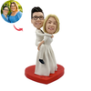 Bobbleheads ślubne Panna młoda niosąca pana młodego