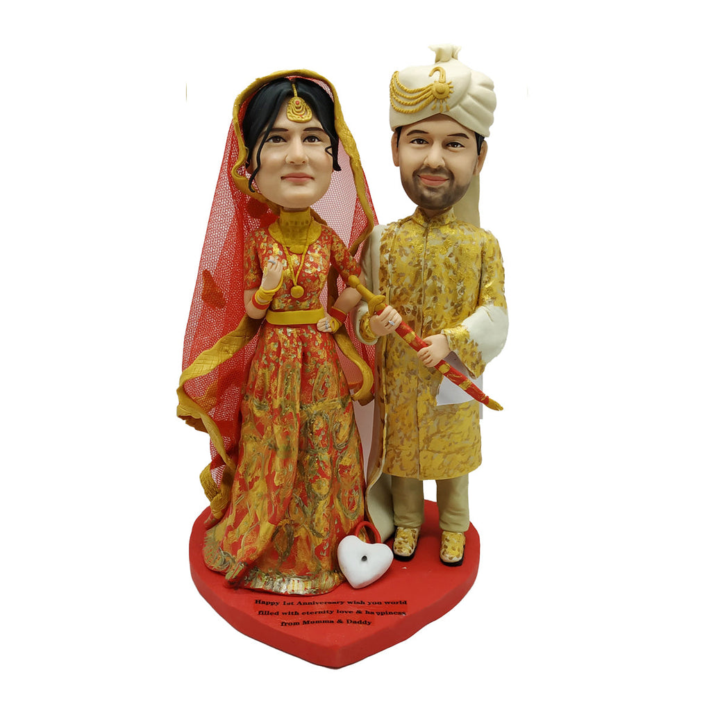 Lalka Bobblehead z indyjską parą ślubną