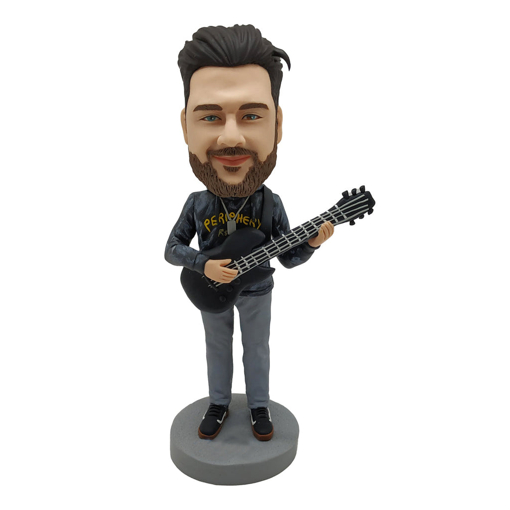 Lalka Bobblehead dla miłośników muzyki z gitarą