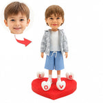 Personalizowana figurka dziecka z ruchomą głową ze zdjęcia z podstawą w kształcie serca