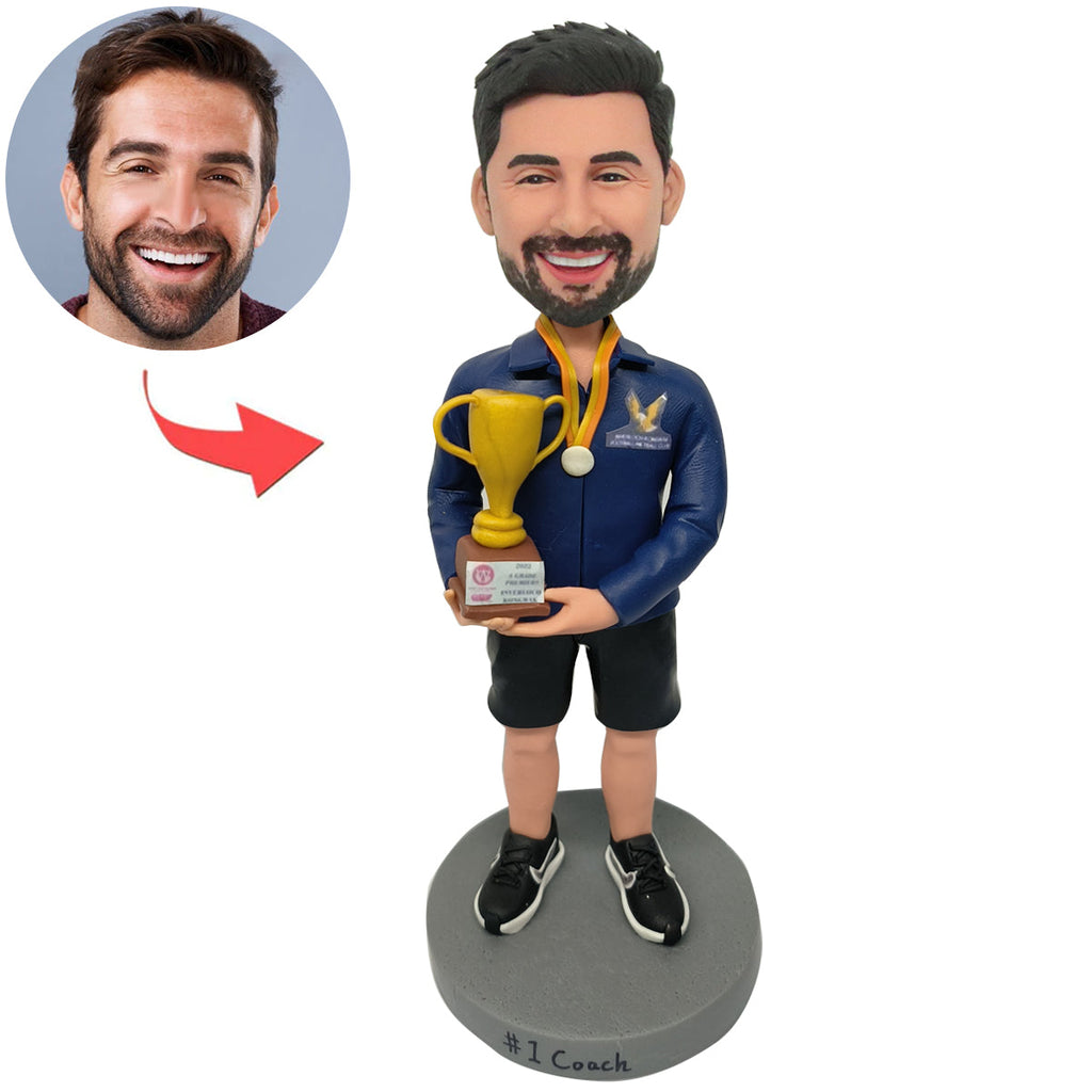 Niestandardowy męski bobblehead z trofeum mistrzowskim