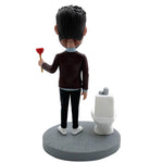 Niestandardowy zabawny bobblehead odblokowujący toaletę