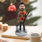 Niestandardowa figurka myśliwego z psem