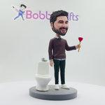 Niestandardowy zabawny bobblehead odblokowujący toaletę