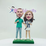 Niestandardowa para Bobblehead grająca w golfa